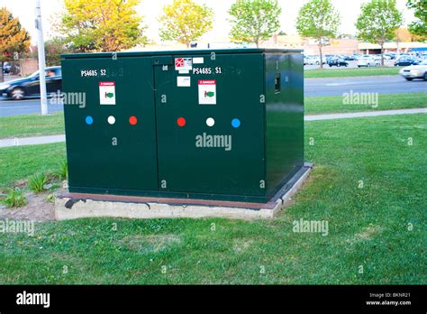 green electrical boxes|green electrical box in street.